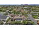 Stunning aerial view of a single-Gathering home with a backyard pool and basketball court, with a mountain range in the background at 6102 E Calle Del Norte --, Scottsdale, AZ 85251