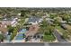 Aerial view showcasing the backyard pool, tennis court, and well-maintained landscaping at 6102 E Calle Del Norte --, Scottsdale, AZ 85251