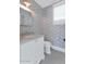 Charming powder room with floral wallpaper, elegant vanity and decorative mirror at 6102 E Calle Del Norte --, Scottsdale, AZ 85251