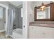 Bathroom features a white vanity and a tiled shower with glass door at 6102 E Calle Del Norte --, Scottsdale, AZ 85251