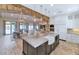 Bright, open kitchen features stainless appliances, granite countertops and island with bar seating at 6102 E Calle Del Norte --, Scottsdale, AZ 85251
