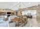 Spacious living area showcases a fireplace, exposed brick archway and seamless flow to the kitchen at 6102 E Calle Del Norte --, Scottsdale, AZ 85251