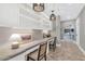 Built-in office space with shelving, desk space with decor, and warm lighting in a shared space at 6102 E Calle Del Norte --, Scottsdale, AZ 85251