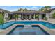 Inviting pool and patio area with comfortable seating under a pergola and tile design at 6102 E Calle Del Norte --, Scottsdale, AZ 85251