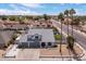 Well-maintained home with palm trees, an expansive front yard, and a convenient three-car garage at 6237 W Altadena Ave, Glendale, AZ 85304