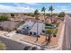 Beautiful home featuring mature palm trees, a spacious front yard, and three-car garage at 6237 W Altadena Ave, Glendale, AZ 85304