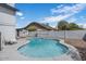 Backyard oasis featuring a refreshing pool, lounge chairs, and a privacy fence at 6237 W Altadena Ave, Glendale, AZ 85304