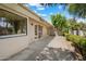 Exterior patio features desert landscaping, and dual doors for outdoor living at 6252 E Aire Libre Ln, Scottsdale, AZ 85254