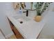 Close-up of bathroom vanity featuring a sleek countertop, modern faucet, and decorative accents for a touch of elegance at 6936 E Whispering Mesquite Trl, Scottsdale, AZ 85266