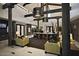 Inviting lobby with comfortable seating, wood beams and bright lights at 6936 E Whispering Mesquite Trl, Scottsdale, AZ 85266