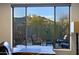 The office space overlooks manicured landscaping and a mountain view at 6936 E Whispering Mesquite Trl, Scottsdale, AZ 85266