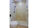 Elegant shower with modern fixtures, hexagon tile, and seamless glass door providing a luxurious bathing experience at 6936 E Whispering Mesquite Trl, Scottsdale, AZ 85266