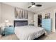 Spacious bedroom features large dressers and closet, ceiling fan, and modern décor at 806 W El Alba Way, Chandler, AZ 85225