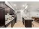 Spacious kitchen with stainless steel appliances, granite countertops, and ample storage space at 806 W El Alba Way, Chandler, AZ 85225