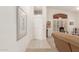 View of the foyer with tile flooring, high ceilings, and an arched window at 9032 W Sierra Pinta Dr, Peoria, AZ 85382