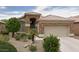 Charming single-story home with stone accents and a well-maintained front yard at 9032 W Sierra Pinta Dr, Peoria, AZ 85382