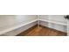 A well-organized pantry featuring sturdy wood shelves and matching wood floors at 915 W Ardmore Rd # 11, Phoenix, AZ 85041
