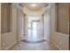Open foyer with decorative tile and arched entryways, showcasing the home's layout at 9698 S 183Rd Ave, Goodyear, AZ 85338