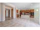 Spacious kitchen featuring wood cabinets, stainless steel appliances, and a large island at 9698 S 183Rd Ave, Goodyear, AZ 85338