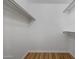 Walk-in closet with shelving for organizing clothes and accessories at 10713 W Santa Fe Dr, Sun City, AZ 85351