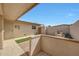 Private courtyard patio featuring brick pavers and secure entry gate at 10713 W Santa Fe Dr, Sun City, AZ 85351
