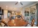 Open concept layout with dining area adjacent to the kitchen and living room at 10846 E Quartet Ave, Mesa, AZ 85212