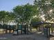 playground featuring slides, bridges, and a shaded picnic area at 10846 E Quartet Ave, Mesa, AZ 85212