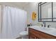 Bathroom featuring a vanity with a modern sink, white shower curtain, and tiled floors at 1231 W Beacon Ct, Casa Grande, AZ 85122