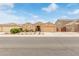 Charming single-story home featuring a desert landscaped front yard and attached two-car garage at 1231 W Beacon Ct, Casa Grande, AZ 85122