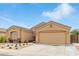 Charming single-story home featuring a desert landscaped front yard and attached two-car garage at 1231 W Beacon Ct, Casa Grande, AZ 85122