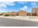 Charming single-story home featuring a desert landscaped front yard and attached two-car garage at 1231 W Beacon Ct, Casa Grande, AZ 85122