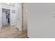 Bright hallway showcasing new flooring, doors, and access to various rooms at 1231 W Beacon Ct, Casa Grande, AZ 85122