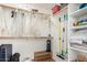 Organized closet with shelves, rods, and storage for clothing and accessories at 13932 N 135Th Dr, Surprise, AZ 85379