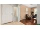 Inviting entryway and living room featuring hardwood floors and natural light at 13932 N 135Th Dr, Surprise, AZ 85379
