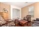 Cozy living room with stylish furnishings and an open layout, great for entertaining at 13932 N 135Th Dr, Surprise, AZ 85379