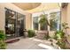 Relaxing outdoor patio with comfortable seating, shaded by a stylish awning at 13932 N 135Th Dr, Surprise, AZ 85379