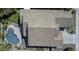 Aerial view of a home with a private pool, well-manicured yard, and tile roof at 1394 E Grand Canyon Dr, Chandler, AZ 85249