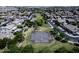 Aerial shot of community park with basketball court surrounded by residential homes at 1394 E Grand Canyon Dr, Chandler, AZ 85249