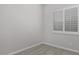 Neutral bedroom with bright white window shutters and plush carpet at 1394 E Grand Canyon Dr, Chandler, AZ 85249