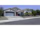 Charming single story home featuring a three car garage and well maintained desert landscaping at 1394 E Grand Canyon Dr, Chandler, AZ 85249