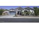 Charming single-story home featuring a two-car garage and professionally landscaped front yard at 1394 E Grand Canyon Dr, Chandler, AZ 85249