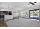 Open floor plan with a large windowed sliding door and a view to the private backyard at 1394 E Grand Canyon Dr, Chandler, AZ 85249