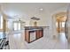 Open kitchen featuring stainless steel appliances and a stylish tile backsplash at 14214 W Ventura St, Surprise, AZ 85379