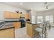 Open kitchen with an island, and a breakfast nook, filled with natural light at 15201 N Zapata Dr, Fountain Hills, AZ 85268