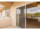 View from balcony showing sliding glass door and the neighborhood at 16013 S Desert Foothills Pkwy # 2055, Phoenix, AZ 85048