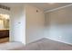 Neutral bedroom offers a calming color palette and plush carpeting at 16013 S Desert Foothills Pkwy # 2055, Phoenix, AZ 85048