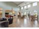 Bright clubhouse featuring a pool table, comfortable seating, and large windows showcasing lush landscaping at 16013 S Desert Foothills Pkwy # 2055, Phoenix, AZ 85048