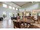Bright community room offering a billiard table, lounge area, and high ceilings with ample natural light at 16013 S Desert Foothills Pkwy # 2055, Phoenix, AZ 85048