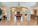 Bright game room with a red billiard table, tile flooring, and open layout perfect for entertaining guests at 16013 S Desert Foothills Pkwy # 2055, Phoenix, AZ 85048