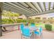 Outdoor patio with a dining table, grill, and a putting green, perfect for entertaining at 16013 S Desert Foothills Pkwy # 2055, Phoenix, AZ 85048